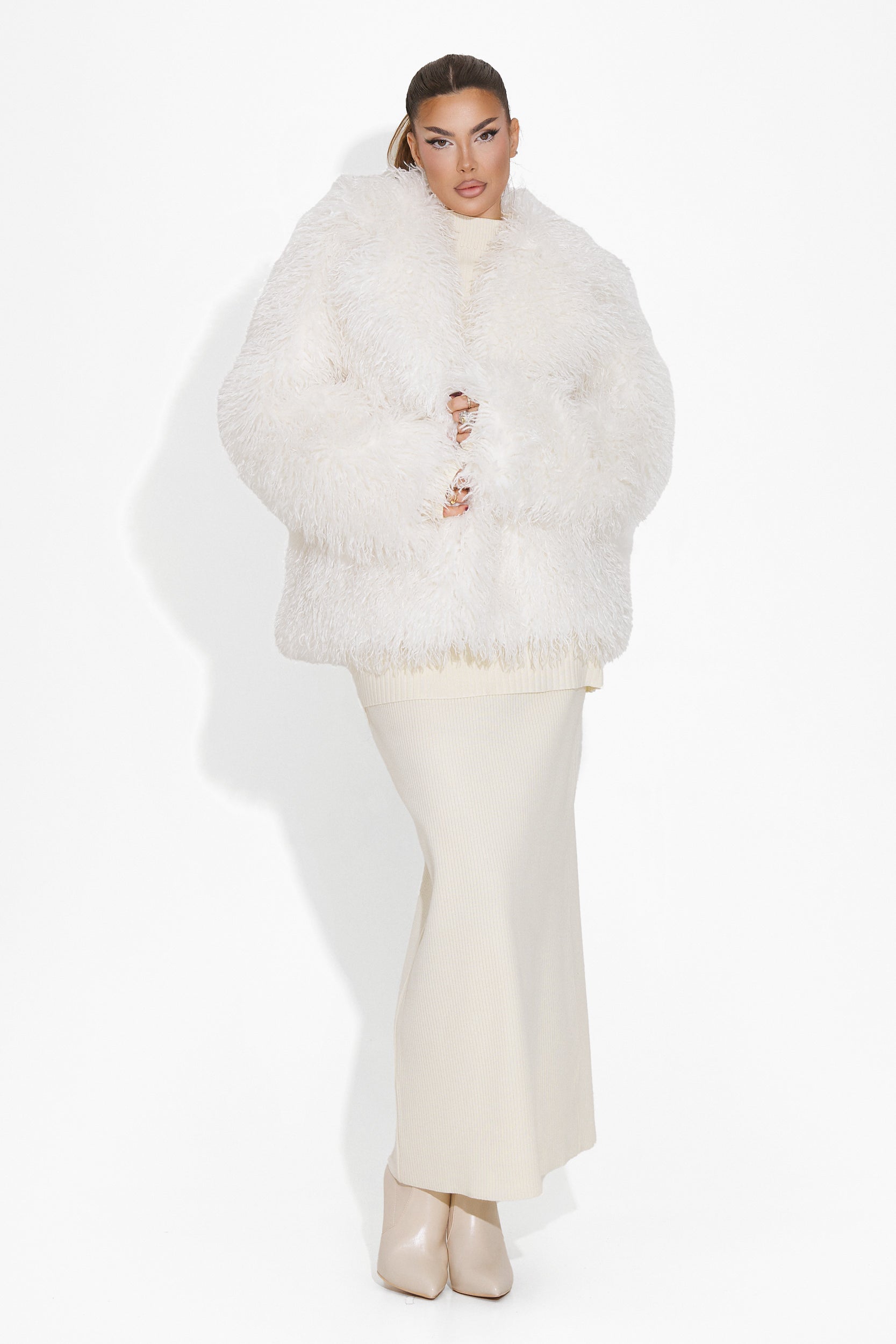 Beige fur coat Geralyn Bogas