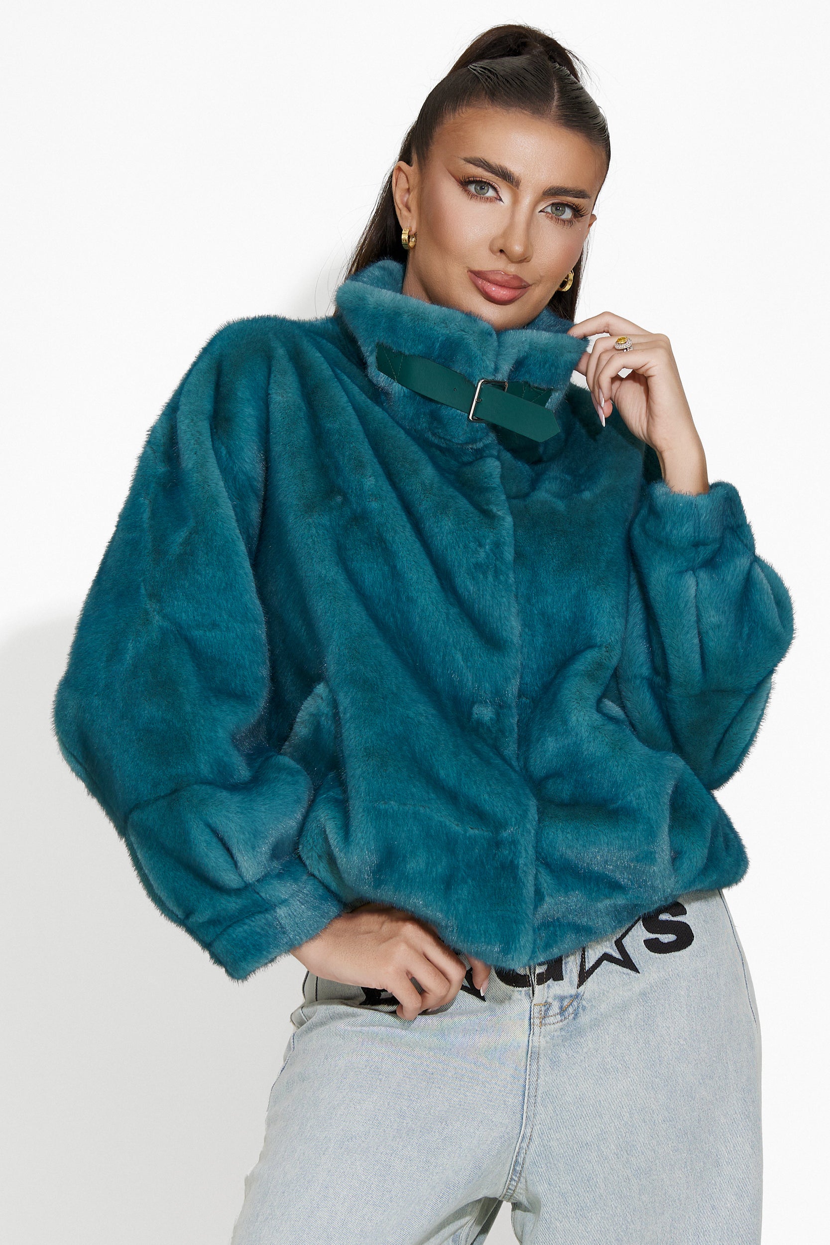 Celina Bogas turquoise fur coat