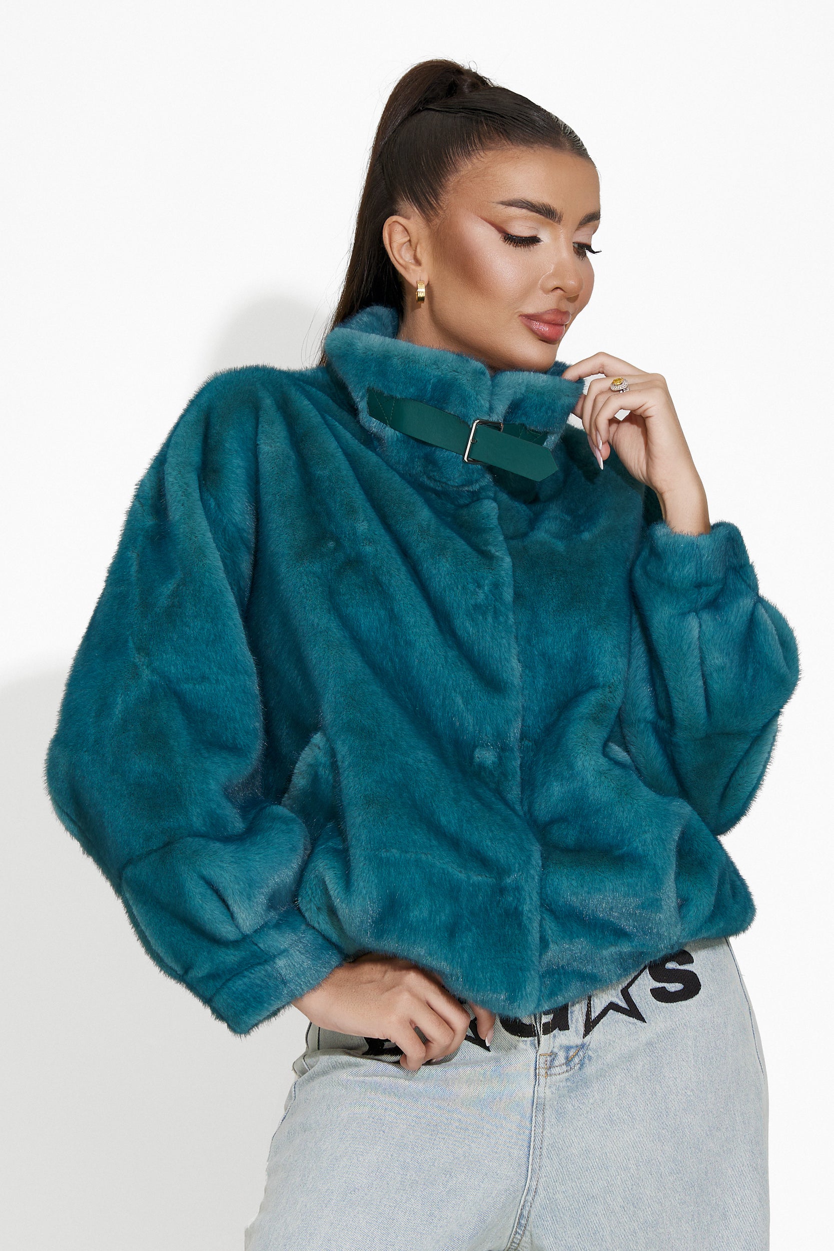 Celina Bogas turquoise fur coat