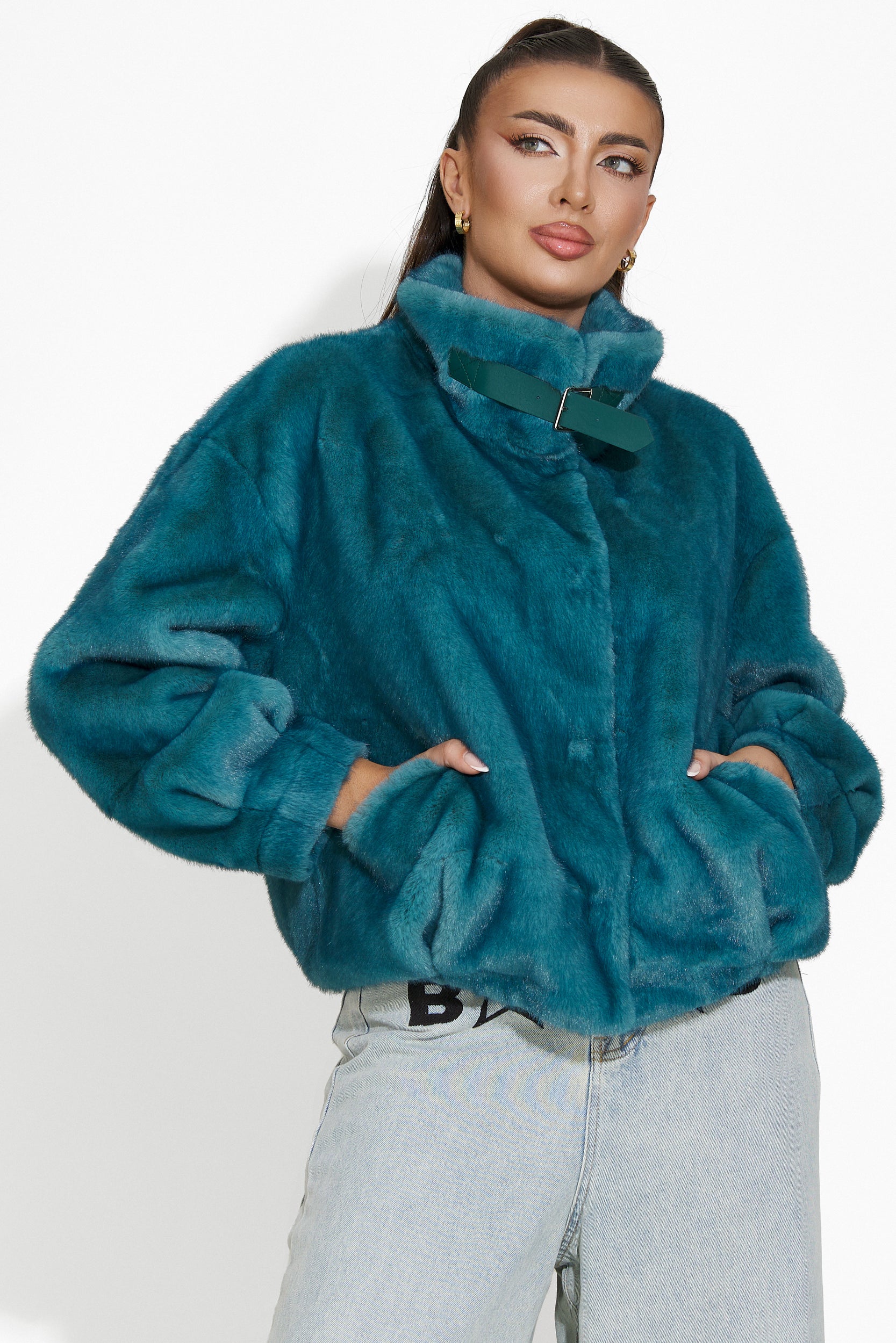 Celina Bogas turquoise fur coat